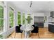 Cozy breakfast nook with bright light and views of nature at 3933 Ayrshire Pl, Charlotte, NC 28210