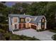 Beautiful two-story home with a spacious driveway, integrated garage, and manicured landscaping showcasing modern elegance at 3933 Ayrshire Pl, Charlotte, NC 28210