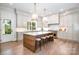 Bright kitchen with stainless steel range, white countertops, and plenty of storage at 4021 Nettie Ct # 7, Charlotte, NC 28211