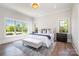 Bright main bedroom with large windows and a comfortable seating area, creating a serene retreat at 4021 Nettie Ct # 7, Charlotte, NC 28211