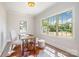 Well-lit office space with large windows offering natural light, complemented by hardwood flooring and modern decor at 4021 Nettie Ct # 7, Charlotte, NC 28211