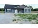 Charming single-story home featuring a new roof, attractive siding, and a well-manicured lawn at 4044 Hurley Walters Rd, Lancaster, SC 29720
