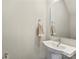 Powder room with vessel sink, modern fixtures, and neutral color scheme at 520 Sedgefield Park Dr, Charlotte, NC 28203