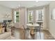 Stylish living room area with a view of the workplace, filled with natural light from the windows at 520 Sedgefield Park Dr, Charlotte, NC 28203