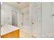 A bright bathroom with a vanity, sink, and shower-tub combination at 5206 Fire Water Ln, Fort Mill, SC 29707