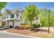 Charming townhome with well-manicured landscaping, featuring a two-car garage at 5206 Fire Water Ln, Fort Mill, SC 29707
