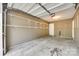A spacious garage equipped with built-in shelving for ample storage at 5206 Fire Water Ln, Fort Mill, SC 29707