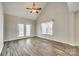 Bright and airy living room with high ceilings and french doors at 5206 Fire Water Ln, Fort Mill, SC 29707