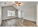 Bedroom featuring a vaulted ceiling, ample natural light, and modern flooring at 5206 Fire Water Ln, Fort Mill, SC 29707