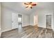 Bright bedroom featuring gray walls, vaulted ceiling, and modern flooring at 5206 Fire Water Ln, Fort Mill, SC 29707