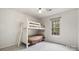 Bedroom featuring bunk beds and natural light at 6915 Norchester Ct, Charlotte, NC 28227