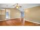 Spacious living room features hardwood floors and open layout at 6915 Norchester Ct, Charlotte, NC 28227