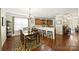 Dining area and kitchen with hardwood floors and plenty of seating at 79115 Ridgehaven Rd, Lancaster, SC 29720