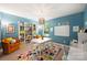 Inspiring playroom with bright colors, a cozy reading nook, and lots of storage at 79115 Ridgehaven Rd, Lancaster, SC 29720