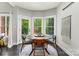 Cozy dining area with natural light and views to a wooded area at 8032 Turnberry Ln, Stanley, NC 28164