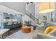 An open-concept living space featuring a kitchen with island, living room, and staircase at 8032 Turnberry Ln, Stanley, NC 28164