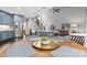 Open concept kitchen and dining area with staircase to the second level at 8032 Turnberry Ln, Stanley, NC 28164