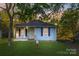 Charming single-story home featuring a cozy front porch, well-maintained lawn, and a mature shade tree at 872 Wellman St, Gastonia, NC 28054