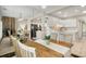 Dining area with table, chairs and view to the kitchen and living room at 8326 Ramath Dr, Charlotte, NC 28211