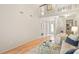 Living room with hardwood floors, natural light, fireplace, and an open layout at 8326 Ramath Dr, Charlotte, NC 28211