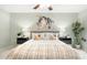 Main bedroom featuring a ceiling fan, neutral walls, and carpeted flooring at 8326 Ramath Dr, Charlotte, NC 28211
