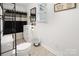 Compact bathroom features white fixtures, modern vanity, and a tub with shower, maximizing space and functionality at 872 Wellman St, Gastonia, NC 28054