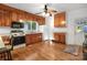 Functional kitchen with hardwood floors, complete with appliances and ample cabinetry for easy meal preparation at 872 Wellman St, Gastonia, NC 28054