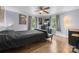 Comfortable bedroom with hardwood floors, lots of natural light and ceiling fan at 127 Bristol Rd, Statesville, NC 28677