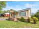 Charming home with a cozy front porch and well-maintained lawn under a bright sky at 127 Bristol Rd, Statesville, NC 28677