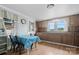 Traditional kitchen featuring wooden cabinets, hardwood floors, and a cozy dining area at 127 Bristol Rd, Statesville, NC 28677