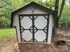 Exterior of an outbuilding with classic doors and a functional design at 127 Hummingbird Cir, New London, NC 28127