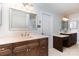 Bathroom features double vanities with marble countertops and decorative mirrors at 1468 Woodhurst Dr, Rock Hill, SC 29732