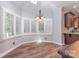 Cozy breakfast nook with hardwood floors, a skylight, and lots of natural light from surrounding windows at 1468 Woodhurst Dr, Rock Hill, SC 29732