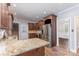 Updated kitchen featuring granite countertops, stainless steel appliances, and wood flooring at 1468 Woodhurst Dr, Rock Hill, SC 29732