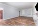 Spacious living room with hardwood floors, and large windows offering plenty of natural light at 1468 Woodhurst Dr, Rock Hill, SC 29732