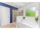 Bright bathroom with a glass shower, bathtub, and window, offering a serene retreat at 1552 Trentwood Dr, Fort Mill, SC 29715