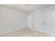 A light and airy bedroom featuring plush carpets and a convenient double door closet at 1552 Trentwood Dr, Fort Mill, SC 29715