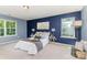 Spacious main bedroom with natural light, stylish decor, and a relaxing atmosphere at 1552 Trentwood Dr, Fort Mill, SC 29715