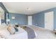 Light and airy main bedroom featuring two doors, a soothing color palette, and soft carpeting at 1552 Trentwood Dr, Fort Mill, SC 29715