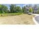 Picturesque vacant lot ready for new construction surrounded by mature trees at 1552 Trentwood Dr, Fort Mill, SC 29715