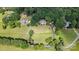 An aerial view of a well maintained property with mature trees at 15546 Thompson Rd, Mint Hill, NC 28227