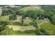 An aerial view of a well maintained property and its surrounding land at 15546 Thompson Rd, Mint Hill, NC 28227