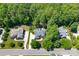 Aerial view of a beautiful home nestled among lush trees and greenery in a suburban setting at 1959 Landry Ln, Rock Hill, SC 29732
