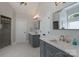This bathroom offers double vanities, a soaking tub, and a tiled shower at 1959 Landry Ln, Rock Hill, SC 29732