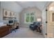 Bright bedroom featuring a desk, comfortable chair, and a window with natural light at 1959 Landry Ln, Rock Hill, SC 29732
