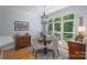 Bright breakfast nook featuring a round table, natural light, and wooden floors at 1959 Landry Ln, Rock Hill, SC 29732