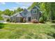 Beautiful two-story home with a well-manicured lawn and mature trees at 1959 Landry Ln, Rock Hill, SC 29732