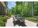 Outdoor patio with comfortable seating and a lush green lawn, perfect for enjoying outdoor meals at 1959 Landry Ln, Rock Hill, SC 29732