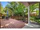 Expansive wooden deck with outdoor seating, perfect for entertaining and enjoying the backyard at 2100 Stonewood Dr, Charlotte, NC 28210