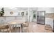 Bright eat-in kitchen with stainless steel appliances and access to the backyard at 2100 Stonewood Dr, Charlotte, NC 28210